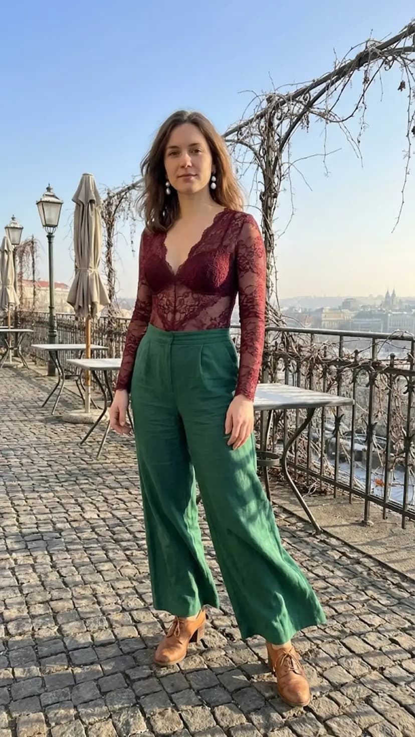 Burgundy Lace Bodysuit + Emerald Wide-Leg Pants + Tan Heeled Booties