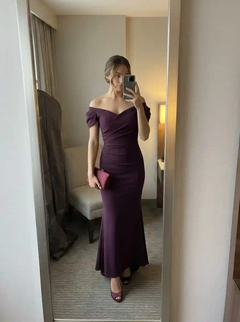 Deep plum off-the-shoulder ruched floor-length gown with short draped cap sleeves