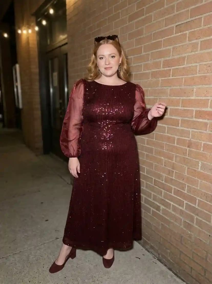 Burgundy sequin midi dress with sheer billowy long sleeves and matching block-heel pumps