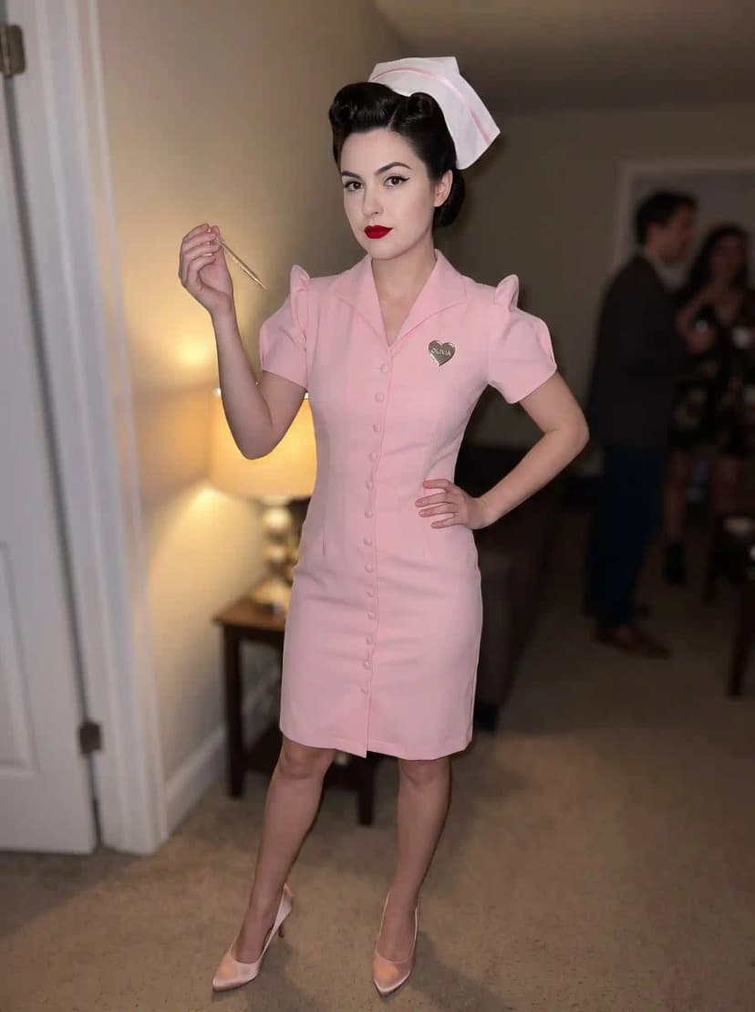 Olivia Rodrigo’s Retro Pink Nurse Look from “The Cure”