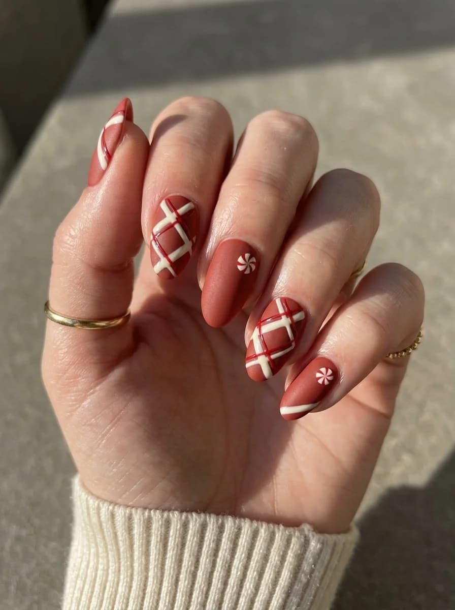 Terracotta nails with white and red plaid accents and white flower accents
