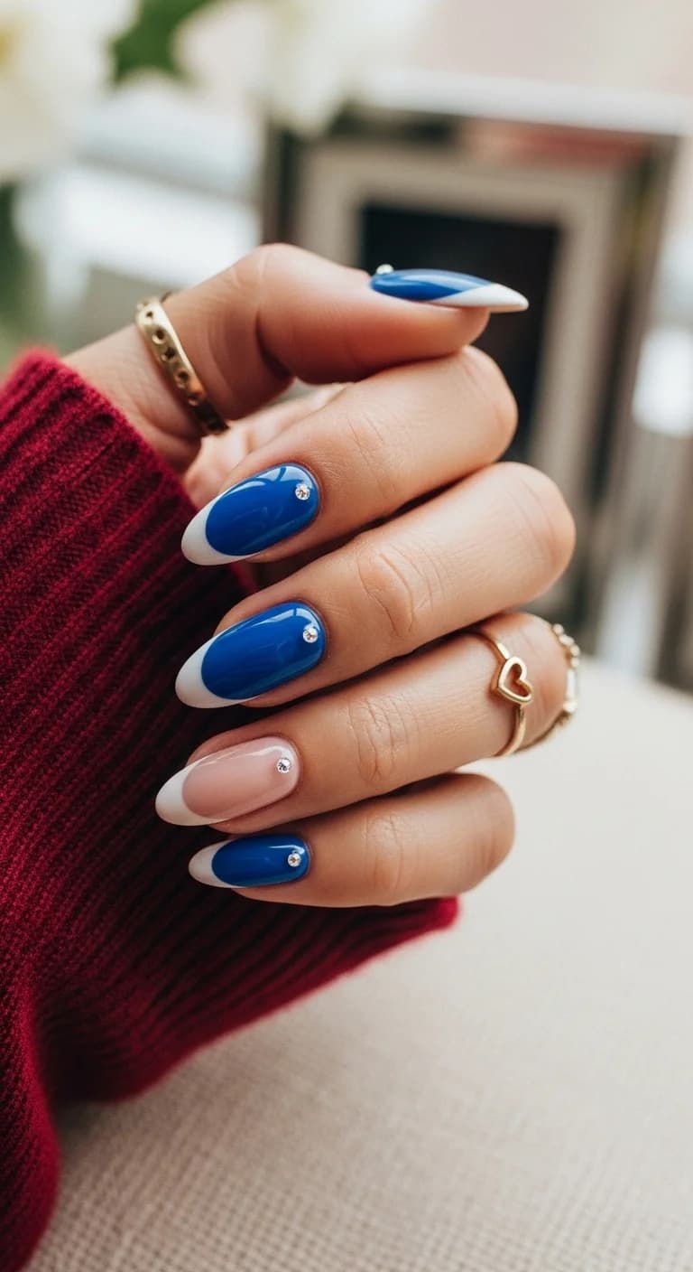Vibrant Blue French Tips with Sparkling Gems