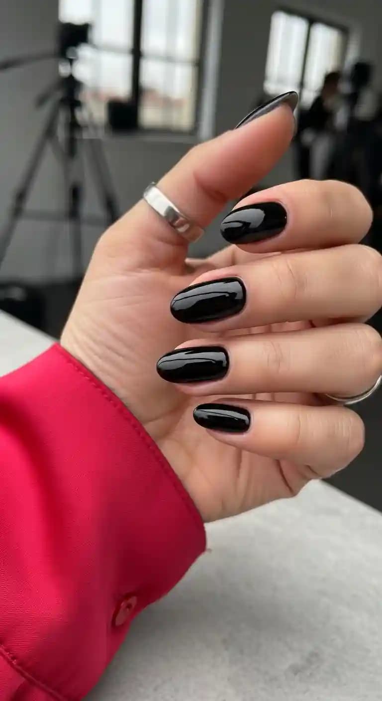 Glossy Black Almond Nails
