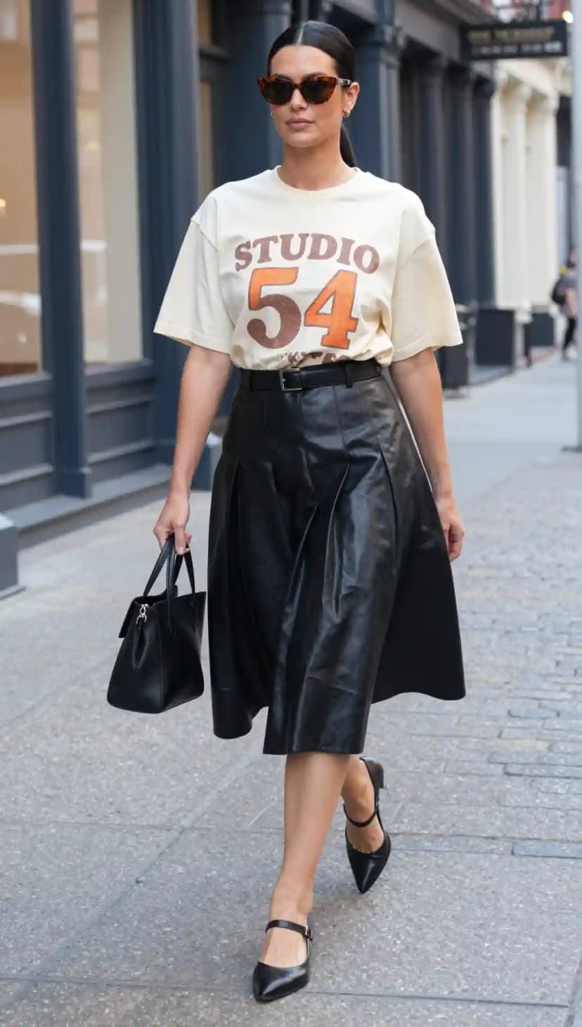 Cream Graphic Tee + Black Faux Leather Midi Skirt + Black Mary Janes